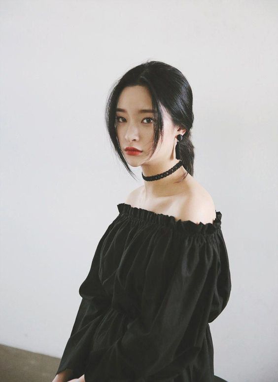 Hairstyle to slim face hair tied up with long bangs centre parting