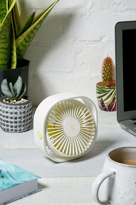 must-have things In The Office to be more comfortable white mini fan on desk