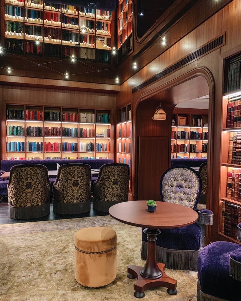 best book cafe in singapore Cook & Tras Social Library seating
