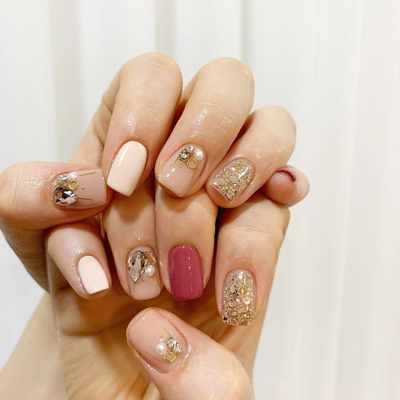 glamorous nude and red Bridal Nail Art with glitter and sparkle