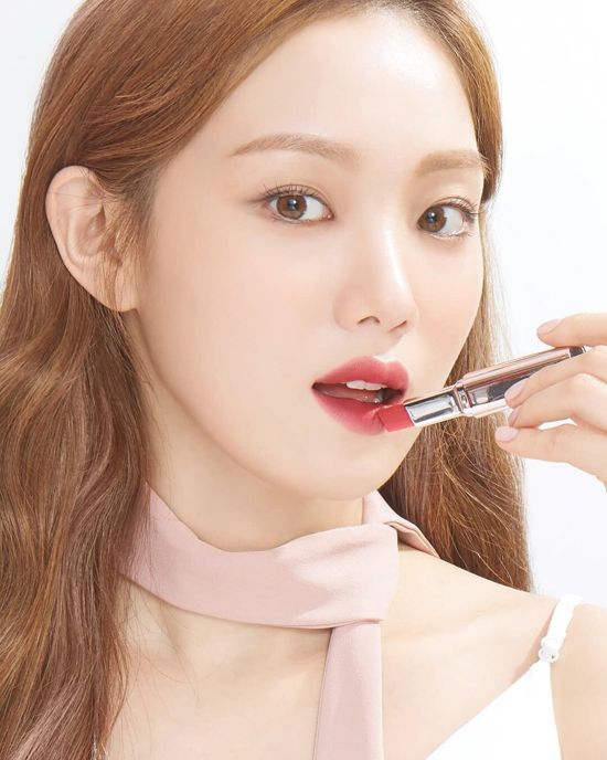 asian woman with dark lipstick To Get Fairer & Brighter Skin: