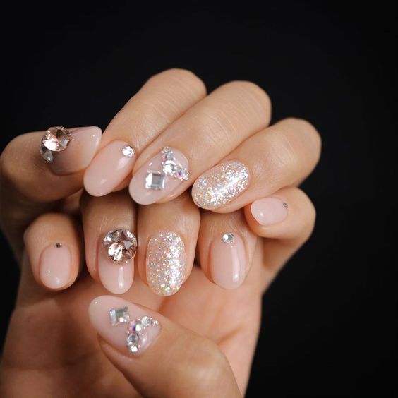 glamorous nude Bridal Nail Art with glitter and sparkle