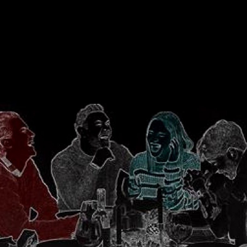 Group of people dining in the dark
