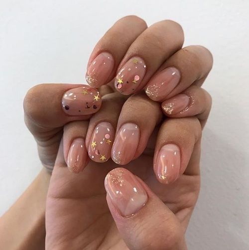 nude Bridal Nail Art with gold sparkle