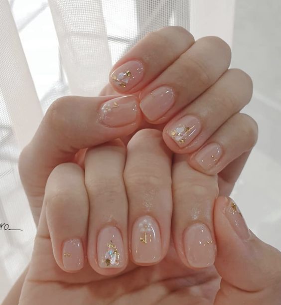 sweet and feminine light nude Bridal Nail Art with glitter and sparkle