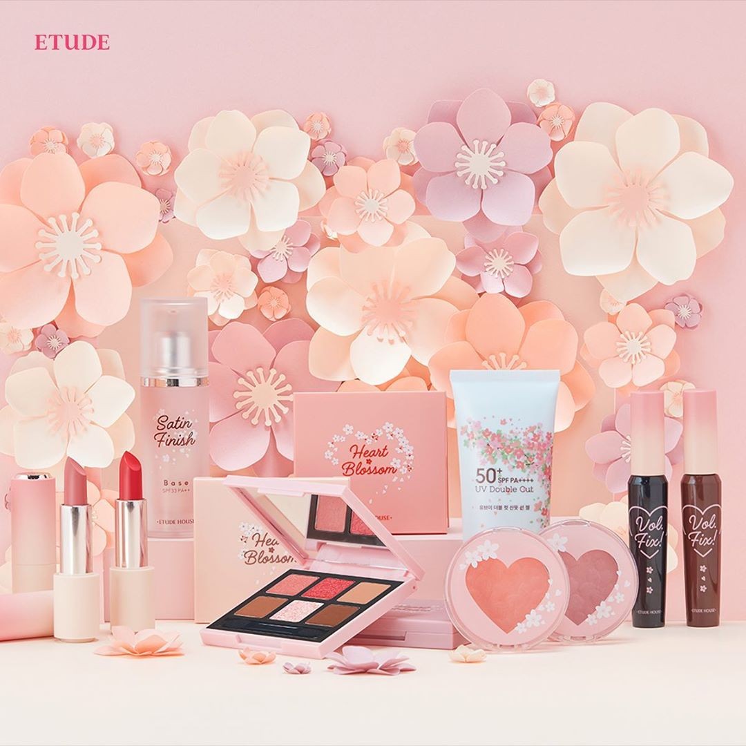 Etude House Heart Blossom products with cherry blossoms in the background