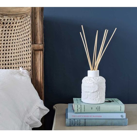 Reed diffuser in a bedroom