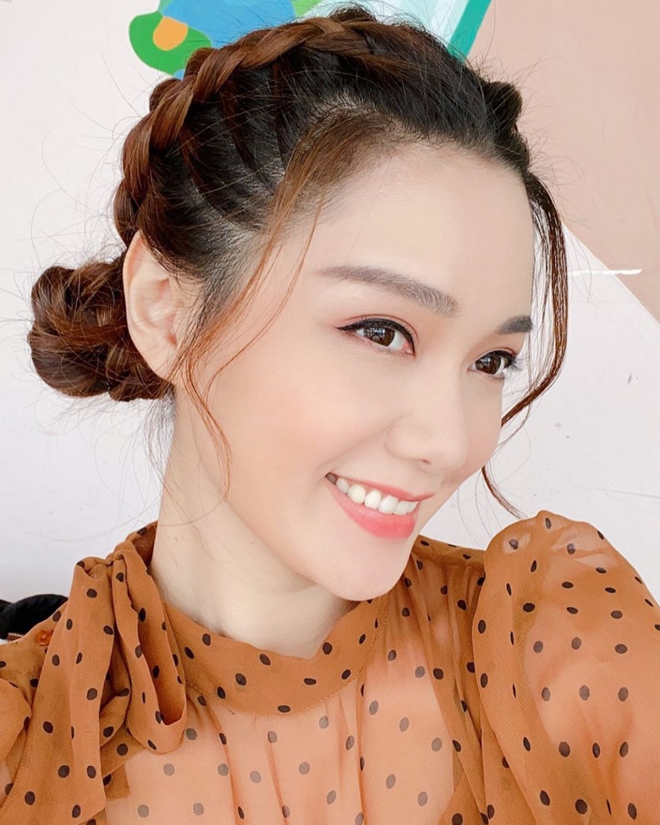 Roxanne Tong with braided bun hairstyle