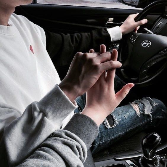 Couple holding hands