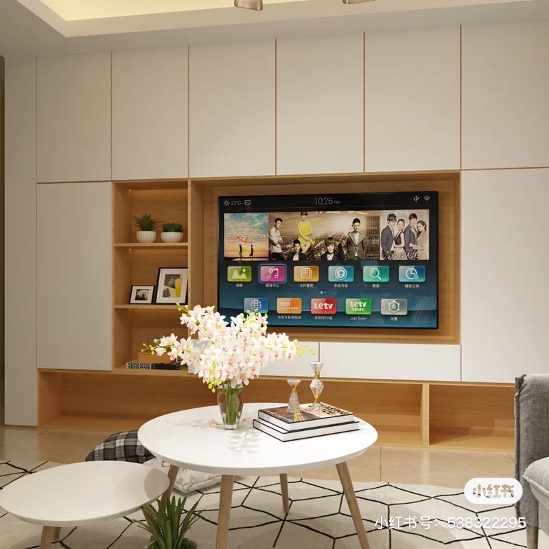 TV console with cupboards surrounding the TV