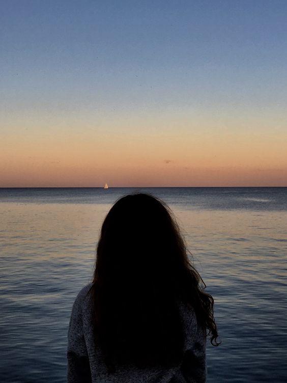 Girl gazing at the beach