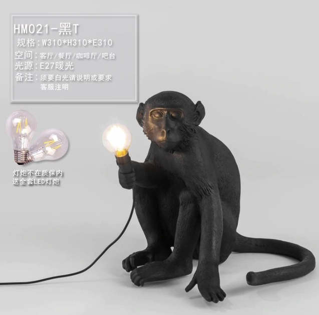 cute Monkey lights sitting down and holding a lightbulb home decor