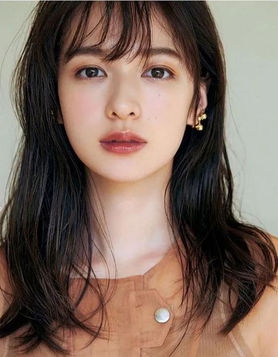 asian woman with dark lipstick To Get Fairer & Brighter Skin: