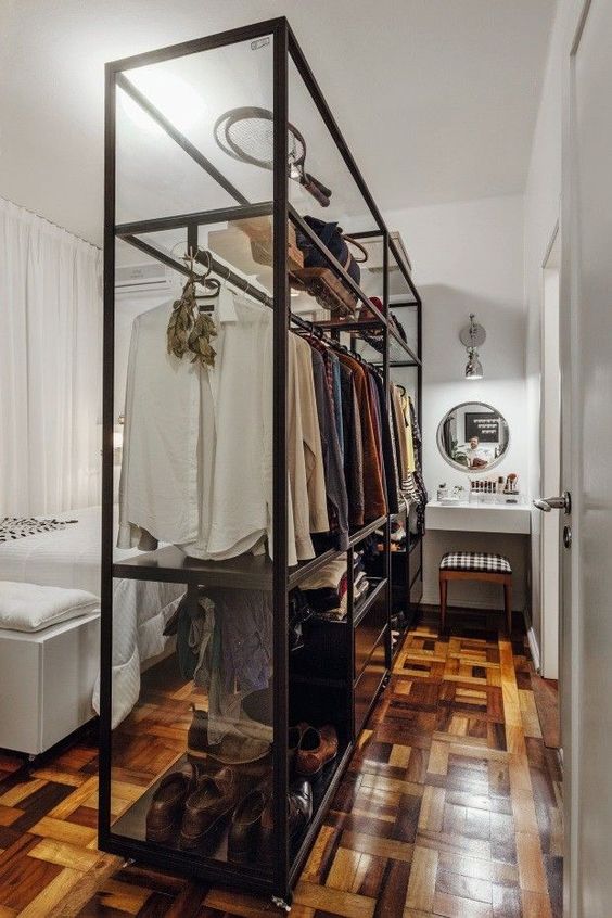 narrow Walk-In Wardrobe In A Small HDB bto Flat room with glass partition with black matte frames