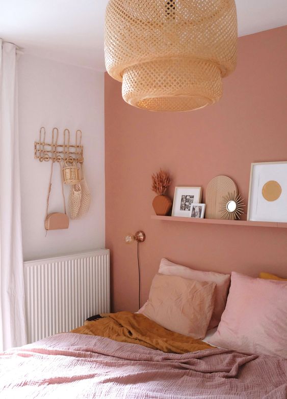 Salmon pink wall in bedroom