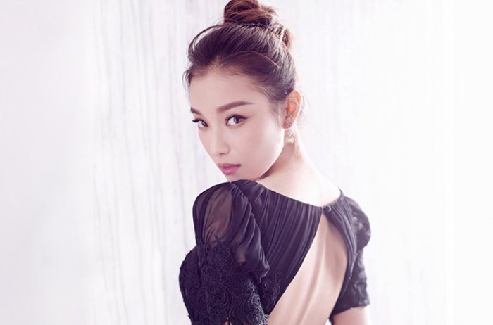 Ni Ni with big voluminous bun