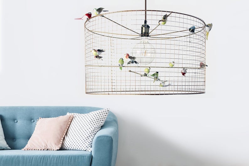 cheap birdcage lamp with birds with blue sofa inspired by Volière lamp by Mathieu Challières
