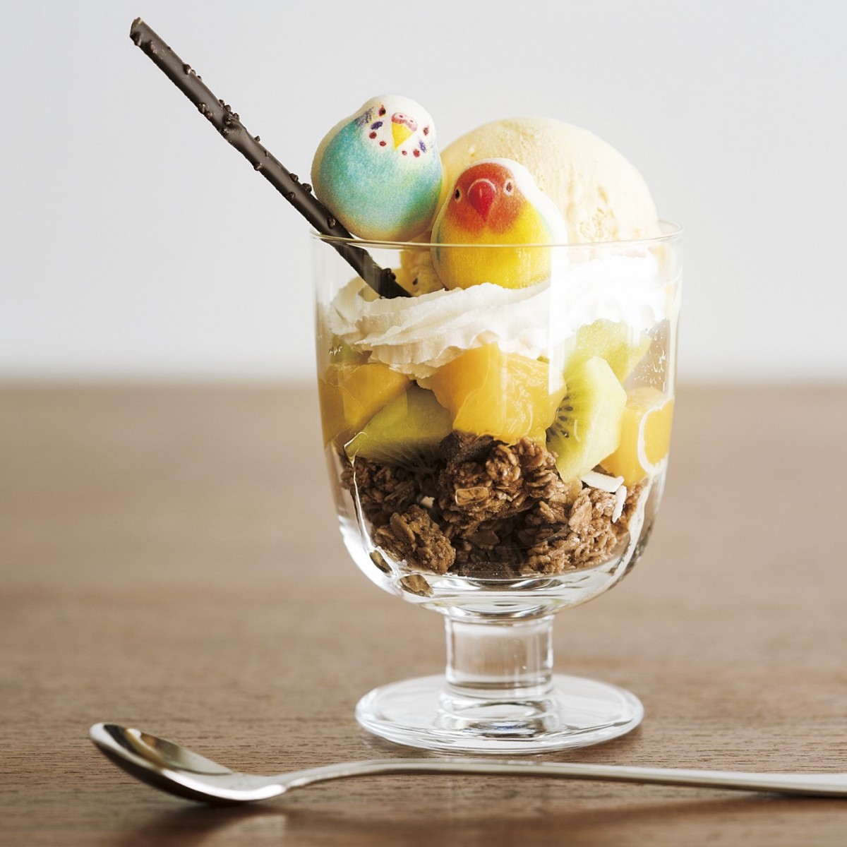 parakeets parrots marshmallows as ice cream toppings