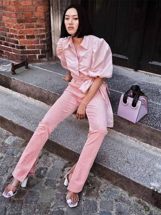 Girl dressed in full pastel pink