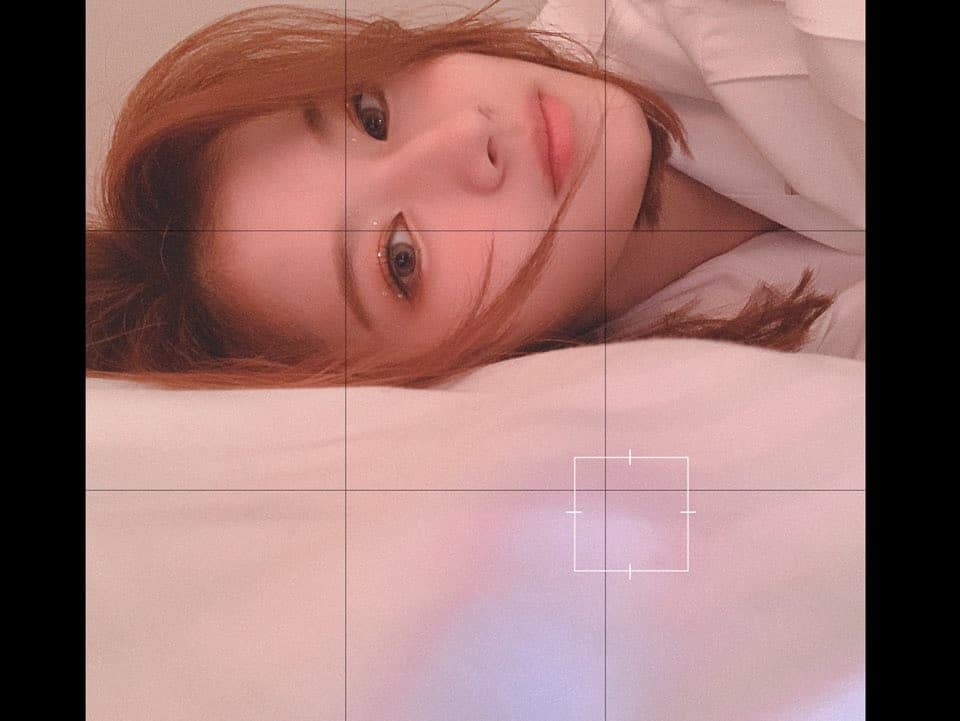 TWICE's Sana with caramel brown hair