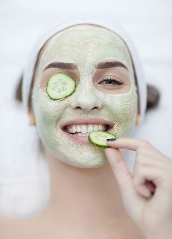 Lady Doing Cucumber Facial 