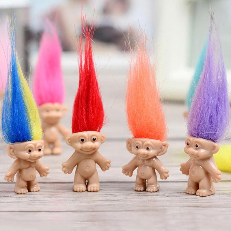 four vintage Troll dolls in red, orange, purple and blue & yellow