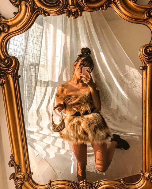 Lady with pillow wrapped up