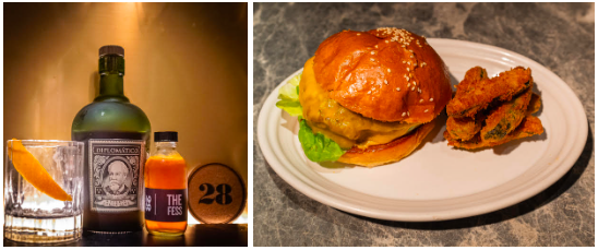 cheeseburger with wedges and liquor bottles with glass cocktail