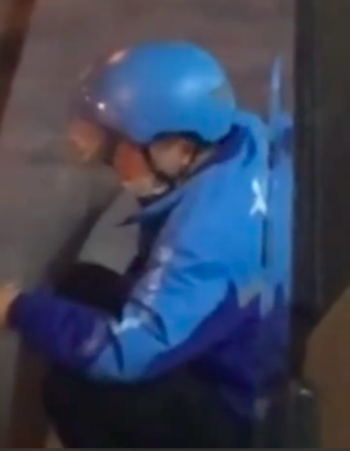 delivery man in china wiping away his tears