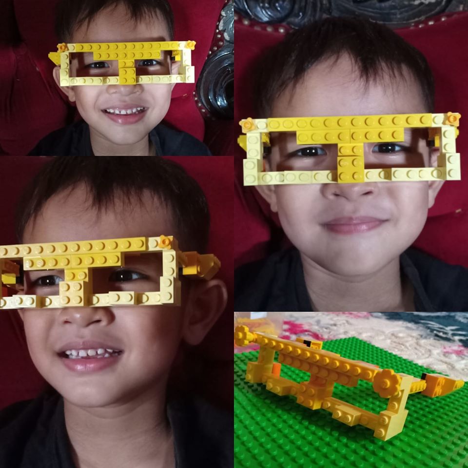 Kid Wearing A Yellow LEGO Glasses