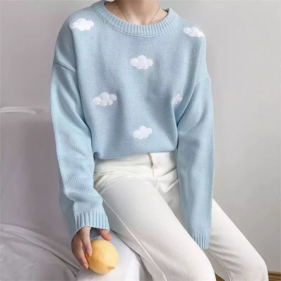 Pastel blue sweater and white pants
