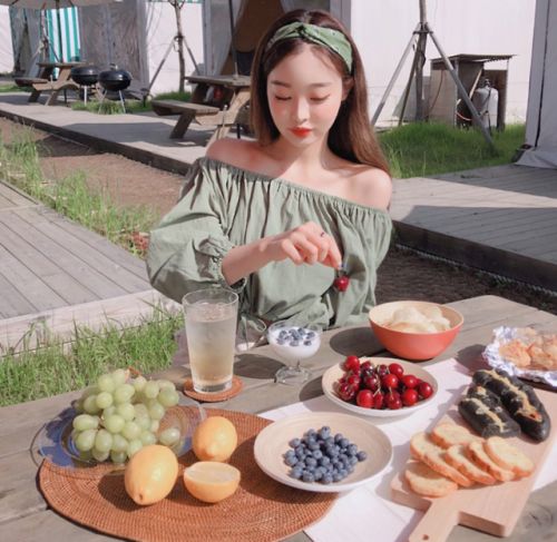 Girl eating outdoors