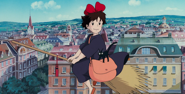 Kiki's Delivery Service flying on a broomstick over the city