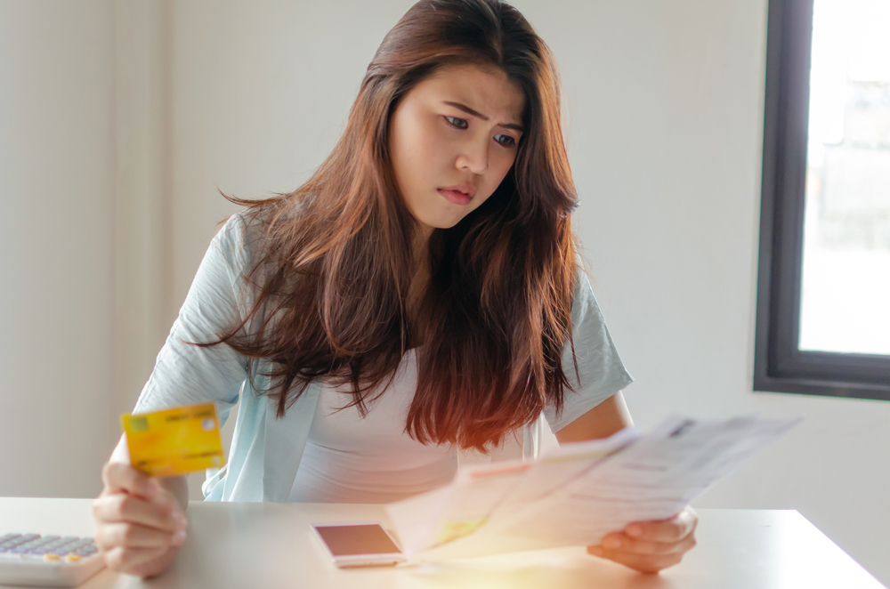 Girl stress over bills