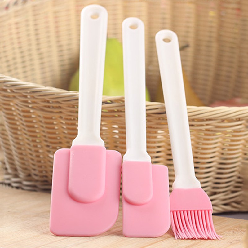 Pink silicone spatula and brush