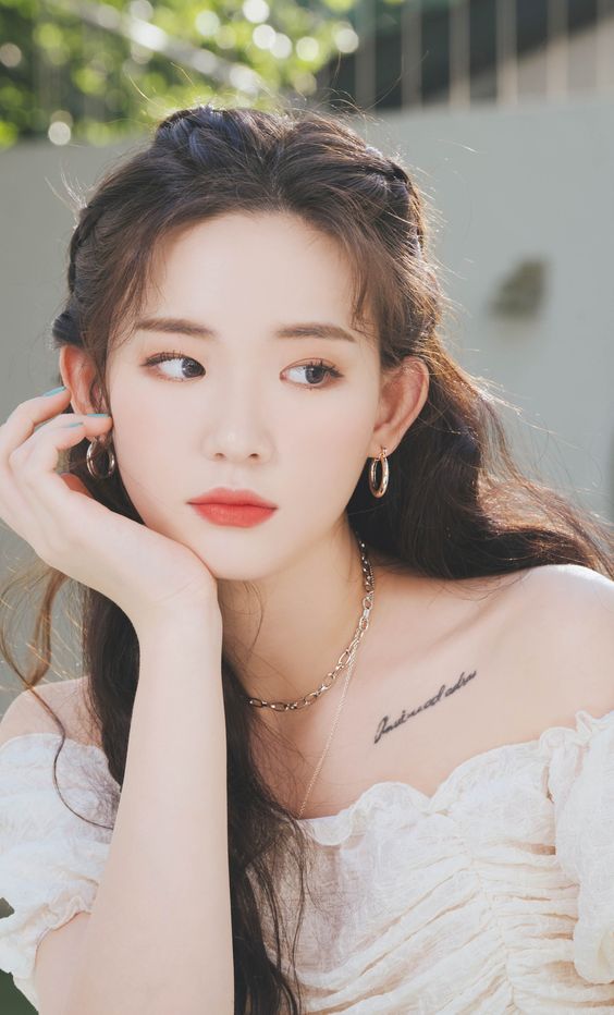 Girl with hair styled and makeup 