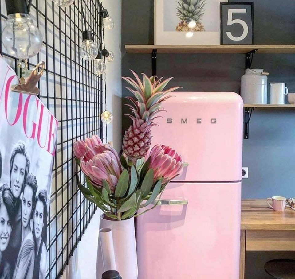 SMEG FAB32 Refrigerator in pink in a kitchen