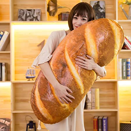 Girl hugging a baguette plush toy
