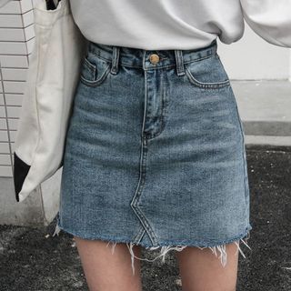 Short denim skirt front view