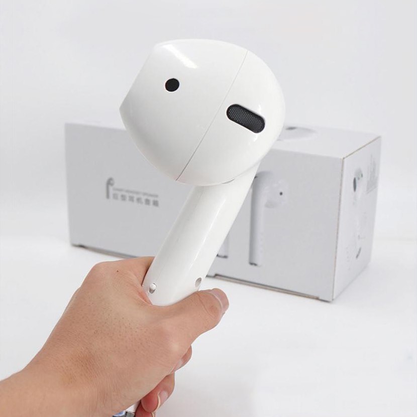 Hand holding huge AirPods speaker