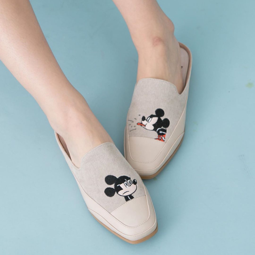 Model wearing Grace Gift Disney Mickey Mouse square toe mules