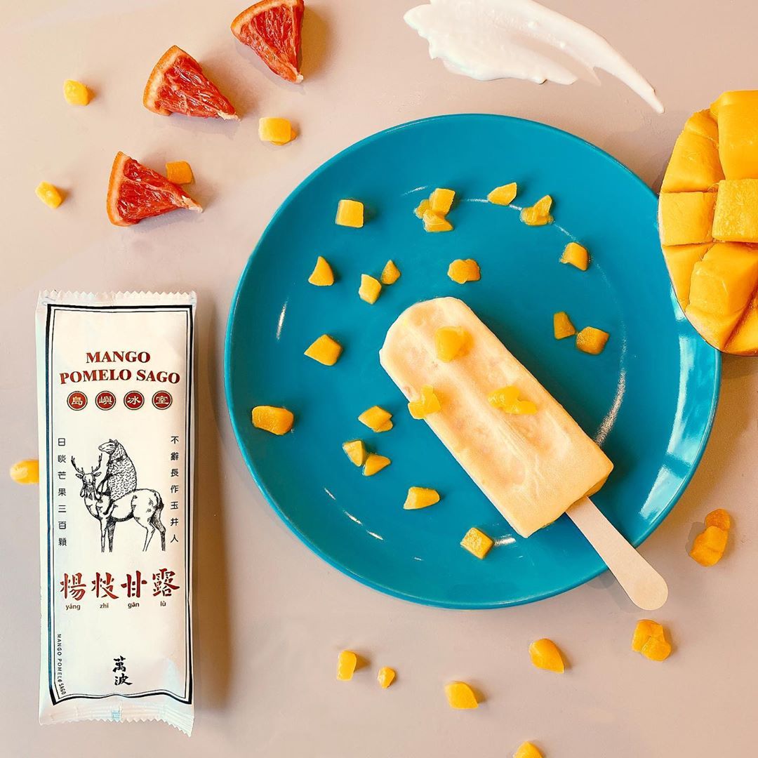 Wanpo Tea Shop mango pomelo sago ice cream on a blue plate
