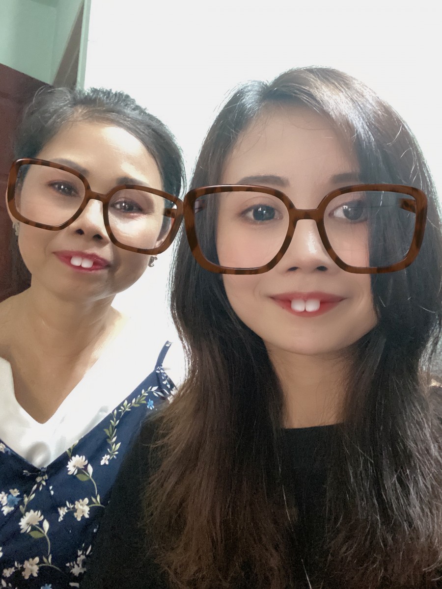 Daughter and mother taking selfie