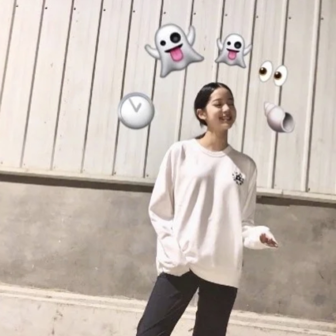 asian girl with emoji rainbow suing white emojis