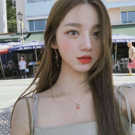 Girl taking selfie with blondish brown hair