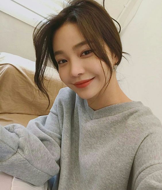 Asian Girl Smiling To Camera