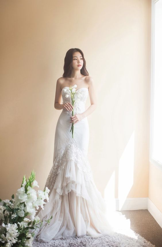 Lady posing in a wedding dress