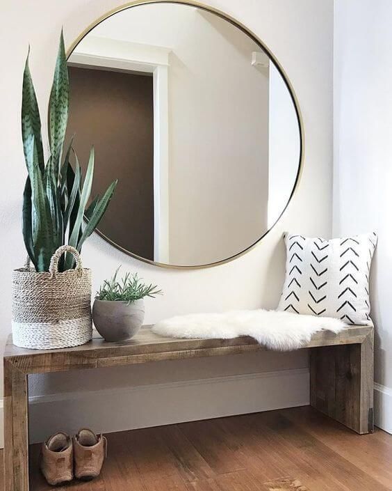 Round mirror mounted on the wall