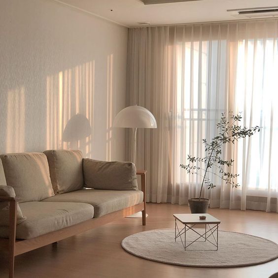 Sheer curtains in minimalist living room