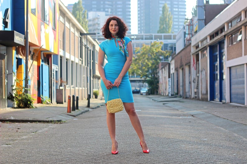 woman holding instant Noodles Purse as a sling bag